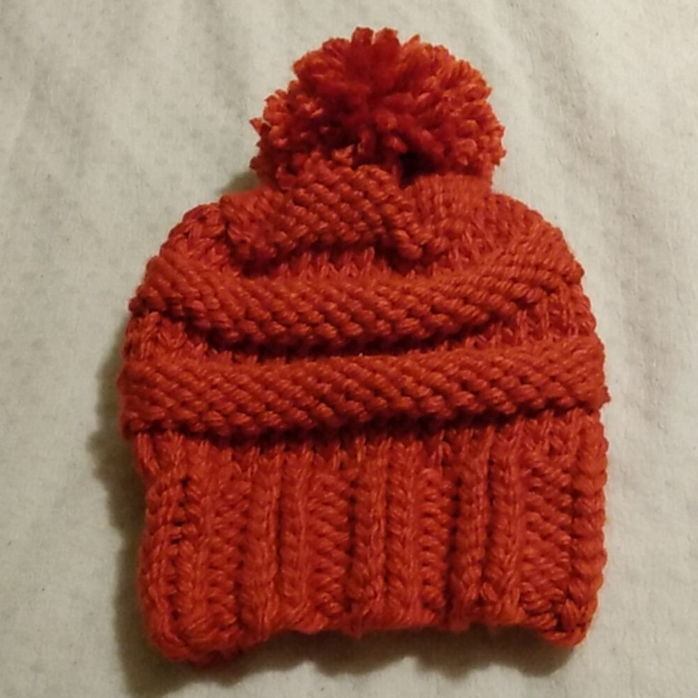 Hand-knit orange stripe hat
